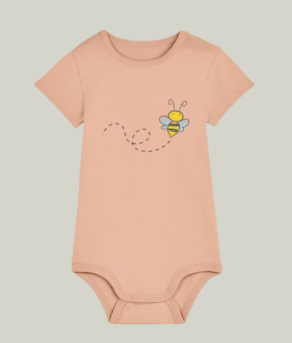 Peach organic cotton baby bodysuit with bee