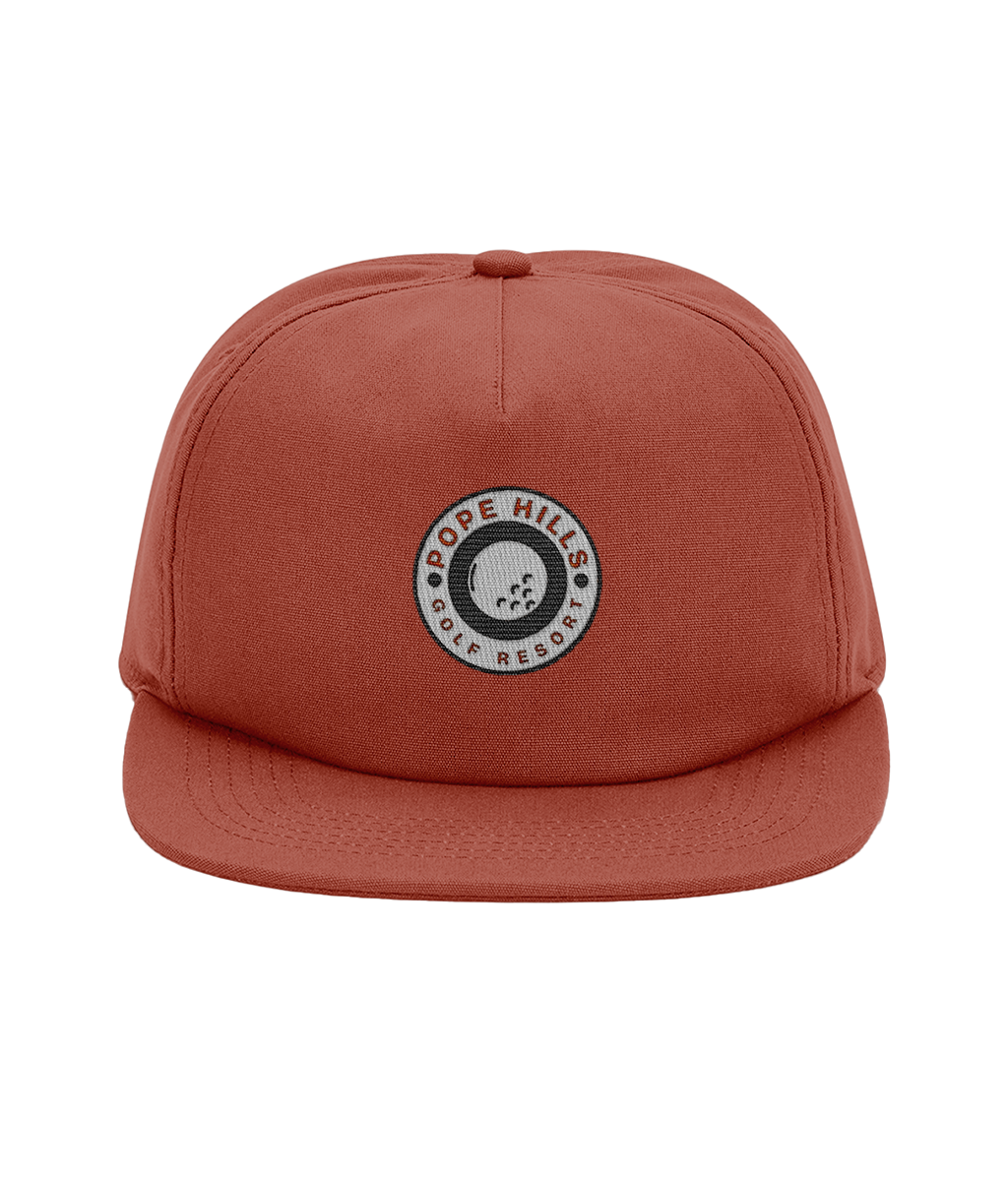 Red terracotta unstructured organic cotton cap with a golf logo 